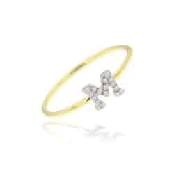 Meira T yellow gold initial ring.